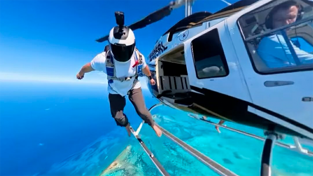 Jumping from a helicopter — join a scheduled skydiving event