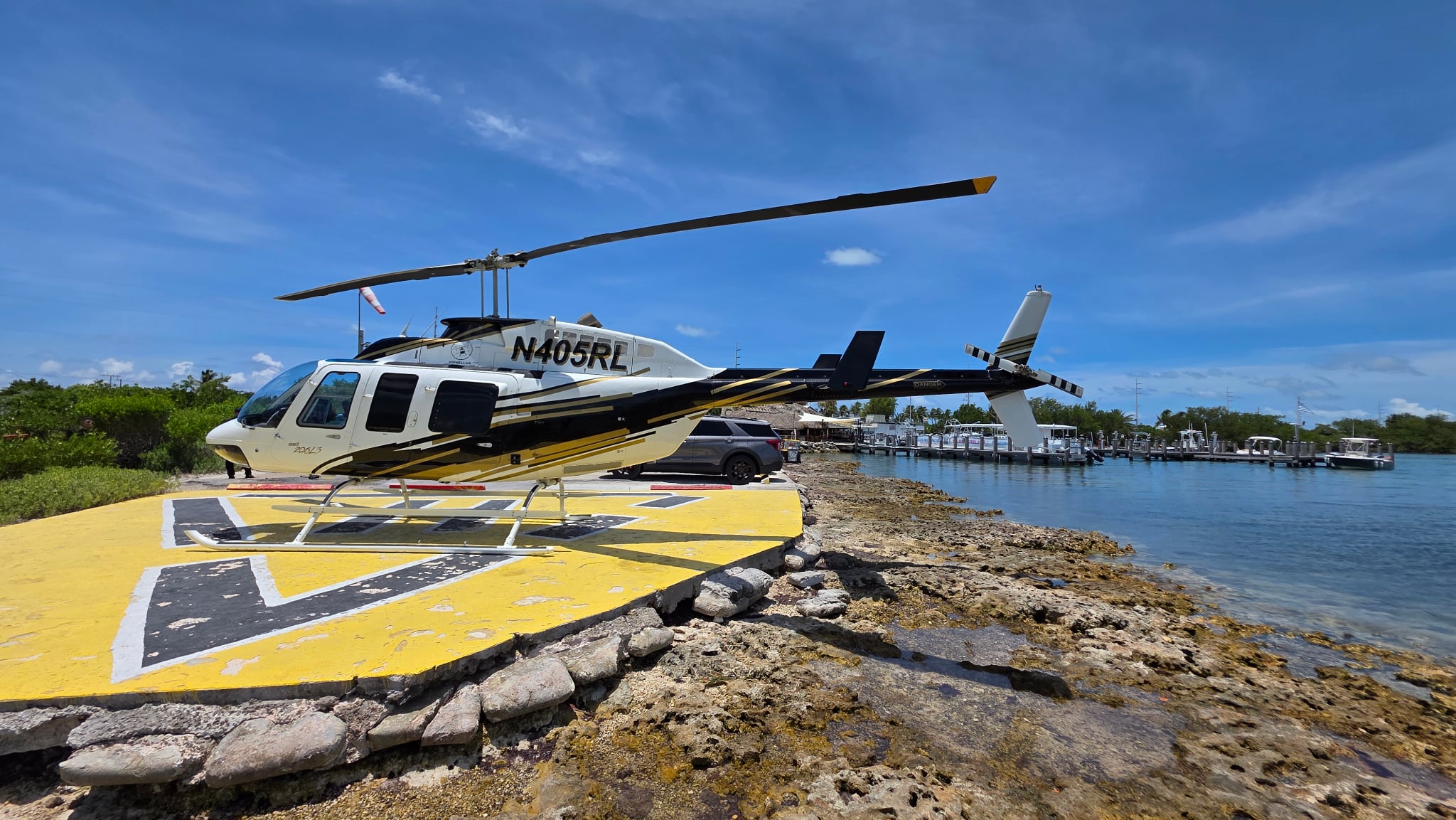 VIP helicopter charter and scenic flight over Fort Lauderdale coastline at sunset
